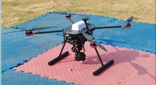 Black Kite tethered drone on a launch mat