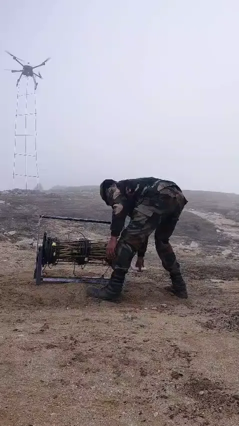 Soldier preparing the Infantry Safe Line drone in the field