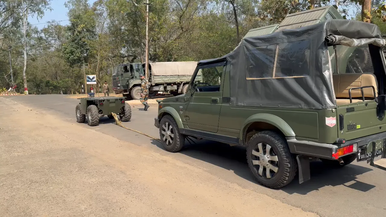 Autonomous UGV following an army vehicle on a road